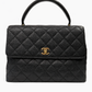 CHANEL KELLY IN BLACK CAVIAR LEATHER WITH TOP HANDLE BAG