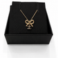 Chanel Bow and Dangling Logo Necklace