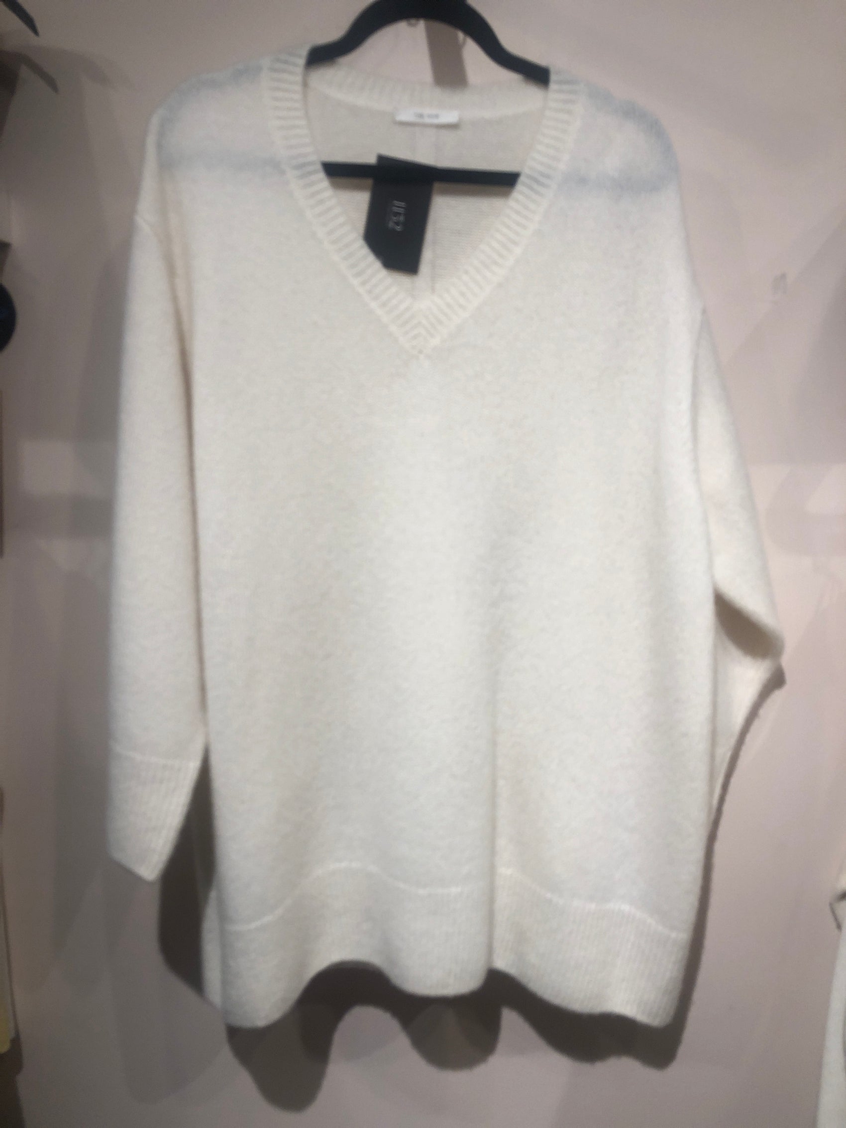 The Row cream sweater