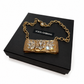 DOLCE AND GABANNA GOLD CRYSTAL BOW NECKLACE