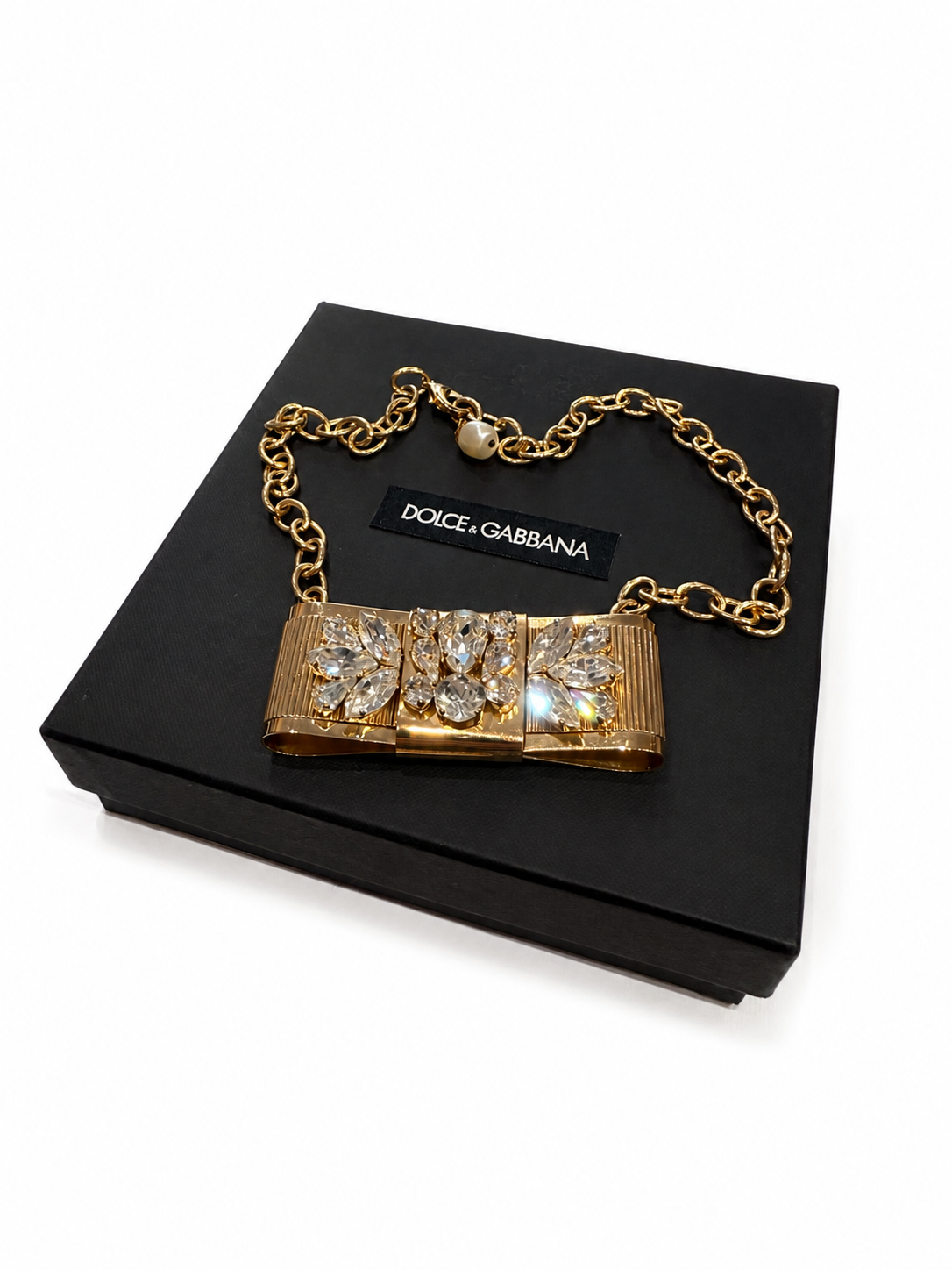 DOLCE AND GABANNA GOLD CRYSTAL BOW NECKLACE