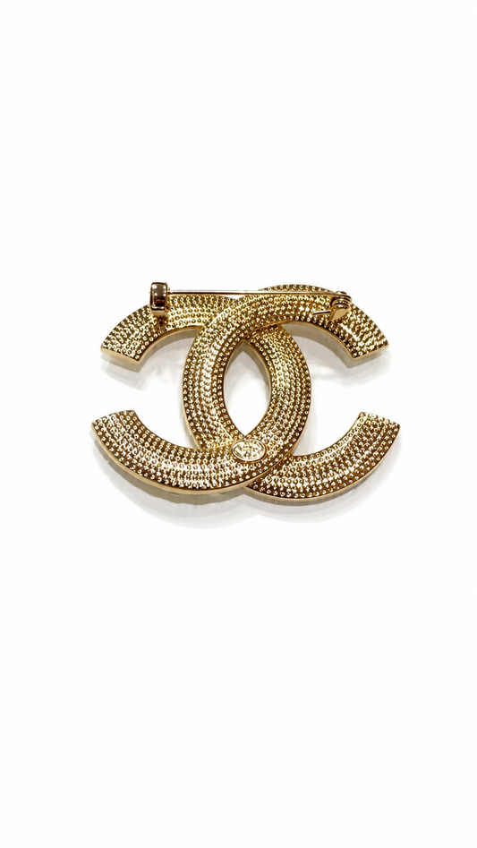CHANEL CLASSIC CC CRYSTAL BROOCH IN GOLD TONE