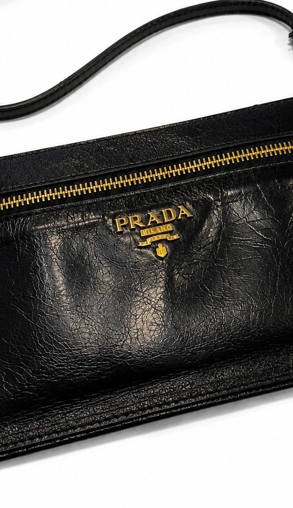 prada black leather top zip clutch with strap
