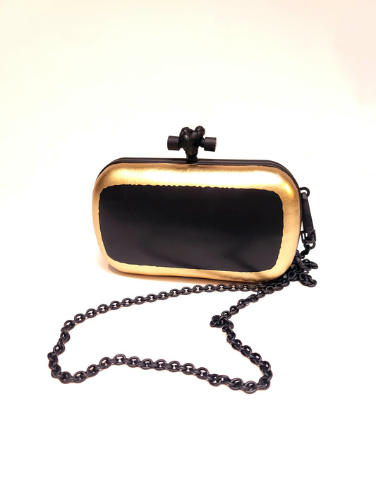 Bottega Veneta Gilded Waxed Leather Knot Clutch Gold Black