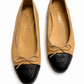 CHANEL BEIGE BALLET FLATS WITH BLACK CAP TOW - SIZE 38.5