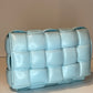 BOTTEGA VENETA PALE BLUE PADDED CASSETTE BAG