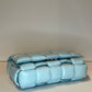 BOTTEGA VENETA PALE BLUE PADDED CASSETTE BAG