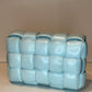 BOTTEGA VENETA PALE BLUE PADDED CASSETTE BAG